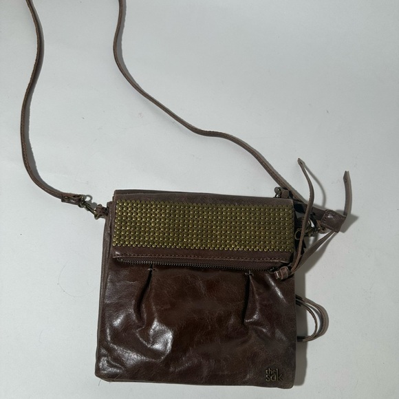The Sak Brown Crossbody Bag with Metallic Accents - Picture 1 of 11